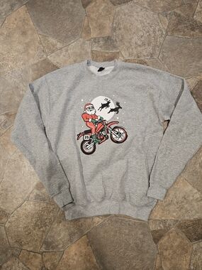 Gildan Grey Crewneck Sweatshirt with Red Santa on Motorcycle Graphic